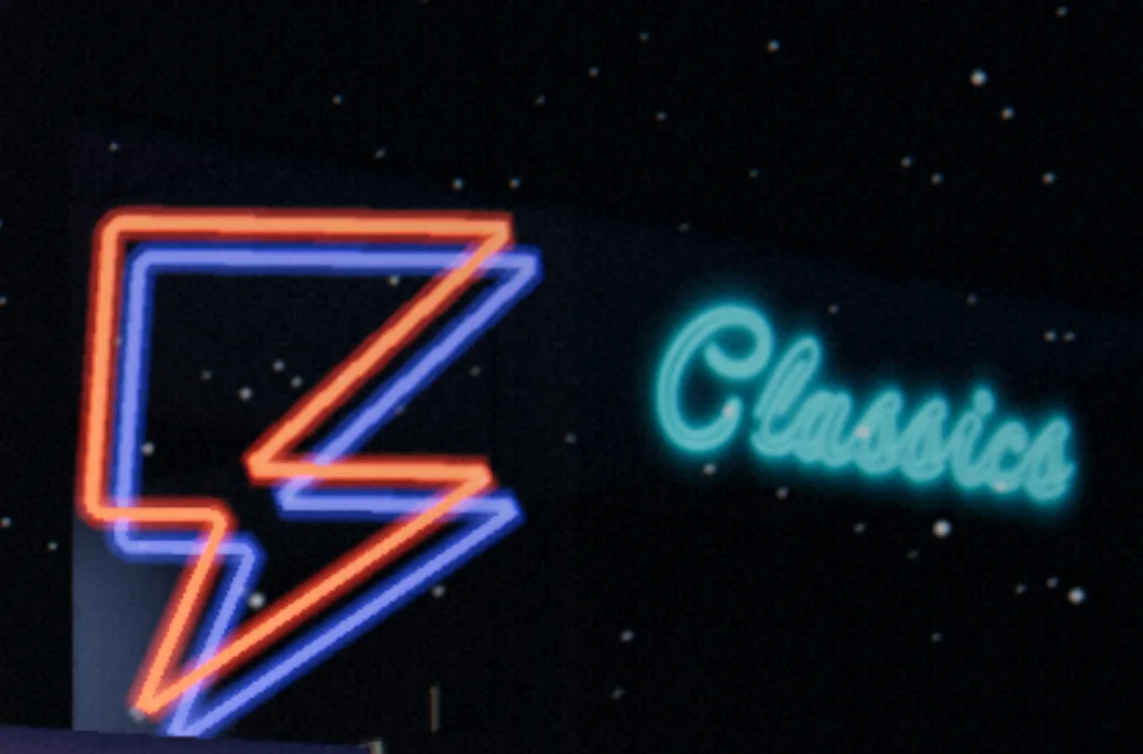 Neon signs in the arcade with lake-effect snow falling, a secret Ziggy unlocks with a code